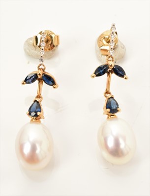 Lot 529 - Pair of 18ct gold cultured pearl, sapphire and diamond pendant drop earrings