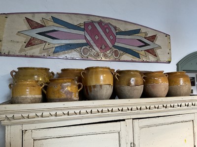 Lot 1642 - Twelve assorted late 19th/early 20th century food storage pots with honey coloured glaze