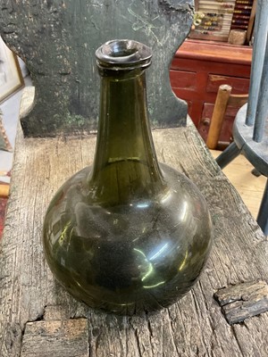 Lot 1670 - Two 18th century Dutch freeblown onion wine bottles, and others (9)