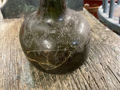 Lot 1670 - Two 18th century Dutch freeblown onion wine bottles, and others (9)