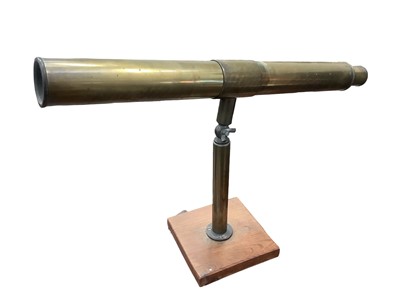 Lot 1701 - Brass 1950s astronomical telescope on a wooden base, made for a child