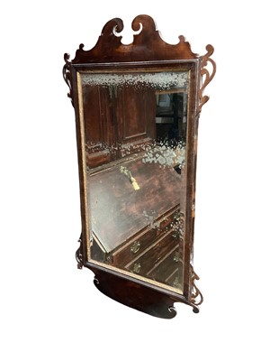 Lot 1758 - Late 18th century Chippendale style mahogany mirror with worn original glass plate.