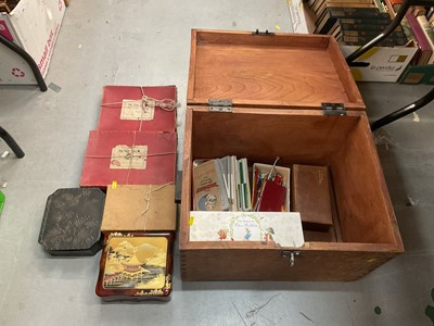 Lot 489 - Wooden trunk containing vintage jigsaw puzzles, playing cards and sundry items.