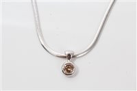 Lot 3278 - White gold (9ct) cinnamon-coloured diamond...