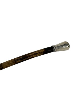 Lot 980 - Late 19th/early 20th century silver mounted elephant tail swagger stick, the silver marks rubbed, makers mark G.L, probably G. Loveridge & Co., 78cm long