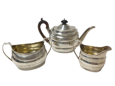 Lot 365 - George III three piece silver teaset