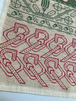 Lot 2052 - Late 19th century/early 20th century embroidered band sampler in polychrome cross stitch.