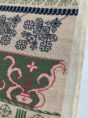 Lot 2052 - Late 19th century/early 20th century embroidered band sampler in polychrome cross stitch.