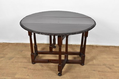 Lot 1360 - Small 18th century red walnut gateleg table