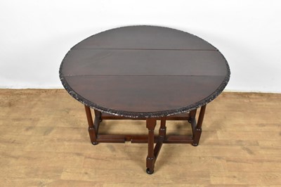 Lot 1360 - Small 18th century red walnut gateleg table
