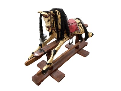 Lot 103 - Vintage wooden painted rocking horse.