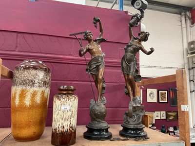 Lot 666 - Pair of spelter figures together with two West German pottery vases (4)