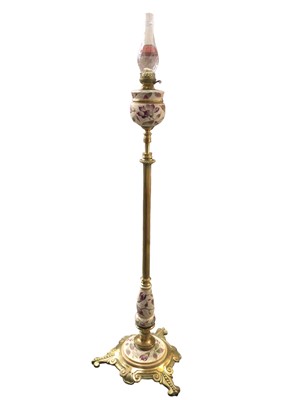 Lot 1377 - Edwardian brass floor standing extending oil lamp with pottery reservoir, marked Hinks & Sons Patent