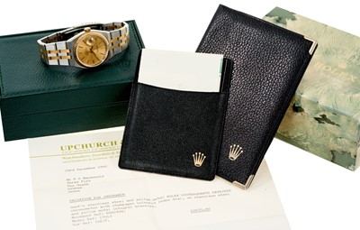 Lot 722 - Gentlemen's Rolex Oysterquartz Datejust chronometer wristwatch, model 17013, with champagne coloured dial, gold bezel, in stainless steel Oyster case on bi-metal integral bracelet, with original gu...
