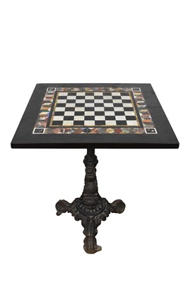 Lot 1300 - Specimen marble chess table on cast iron base