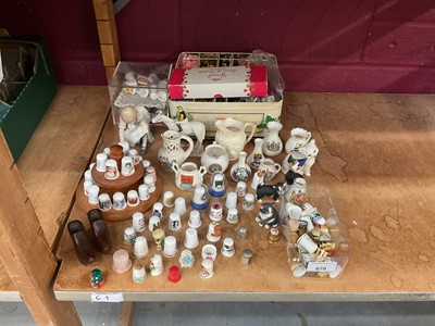 Lot 670 - Royal Copenhagen figure, Royal Doulton cat ornament and group of various thimbles.