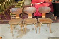 Lot 3682 - Set of three early Eames bent plywood chairs,...