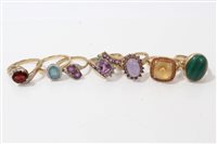 Lot 3257 - Seven gold (9ct) gem set dress rings