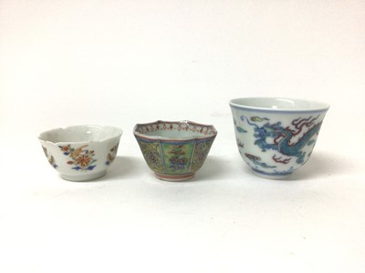 Lot 99 - Three Chinese porcelain tea bowls, including two 18th century and one later Doucai