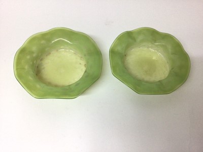 Lot 125 - Pair of Art Nouveau style Vaseline glass dishes with wavy edges, in the style of Powell