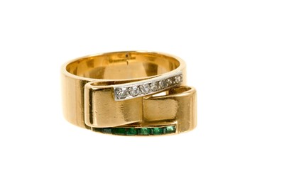 Lot 457 - Art Deco gold emerald and diamond ring, the stylized gold bow with a line of calibre cut emeralds and graduated single cut diamonds