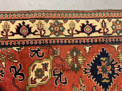 Lot 1534 - Caucasian Kasak rug, with angular foliate design on brick red ground