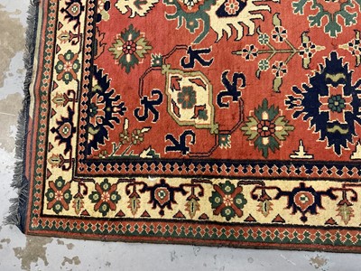 Lot 1534 - Caucasian Kasak rug, with angular foliate design on brick red ground