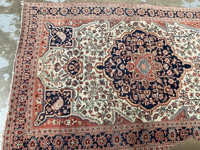 Lot 1539 - Antique Persian rug and three others