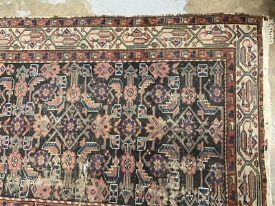 Lot 1539 - Antique Persian rug and three others