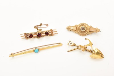 Lot 487 - Late 19th/early 20th century South African gold rush brooch in the form of a spade and pick with nugget, and three other Victorian brooches (4)