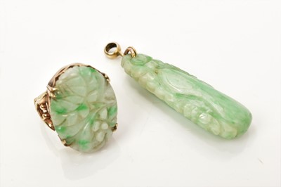 Lot 491 - Antique Chinese carved green jade pendant with fruit and foliage, together with a similar dress ring in 9ct gold setting (2)