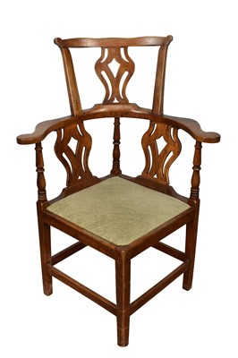 Lot 1352 - George III walnut corner chair, with pierced splat and slip in seat on square chamfered supports