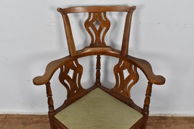 Lot 1352 - George III walnut corner chair, with pierced splat and slip in seat on square chamfered supports