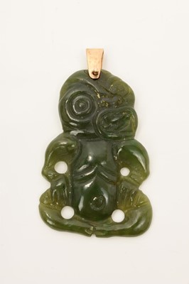 Lot 631 - Old Maori carved jade Tiki fingernail pendant, 50mm x 30mm