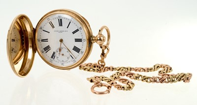 Lot 701 - Late 19th century Swiss gold full hunter pocket watch by Lucien Sandoz & Co, Locle. in gold (56 standard) case with engine turned decoration on rose gold and green gold watch chain