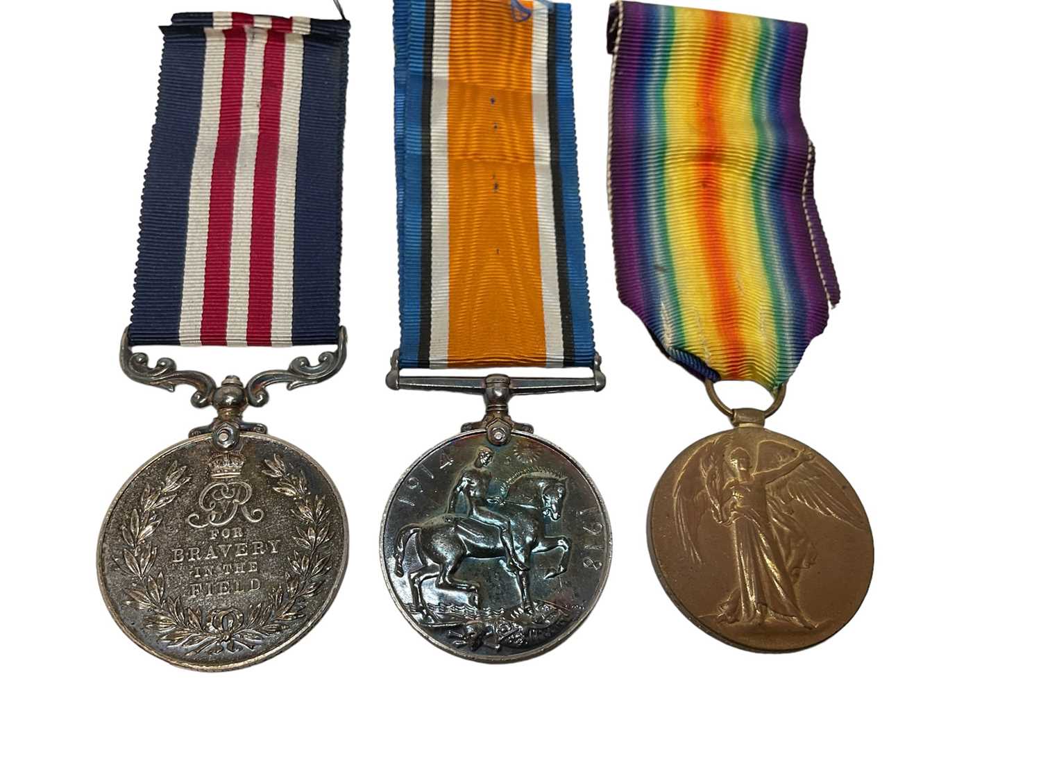 Lot 701 - First World War Military Medal (M.M.) Gallantry trio comprising M.M. named to 78092 PTE. H. Outen. 2/R.FUS. together with War and Victory medals named to 5229 PTE. H. Outen. R. Suss. R.