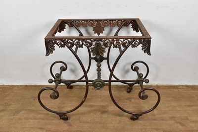 Lot 1370 - 19th century metal table base, with classical pierced frieze and raised on scrolling understructure and castors, 101cm wide x 54cm deep x 82cm high