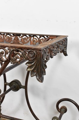 Lot 1370 - 19th century metal table base, with classical pierced frieze and raised on scrolling understructure and castors, 101cm wide x 54cm deep x 82cm high