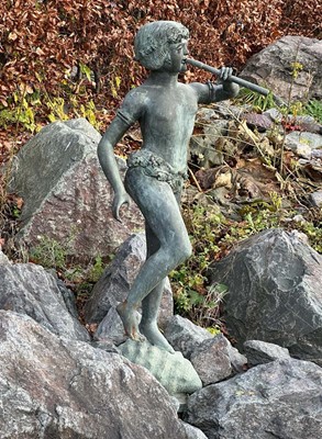 Lot 1376 - An impressive bronze garden fountain, modelled as Peter Pan standing atop a conch shell