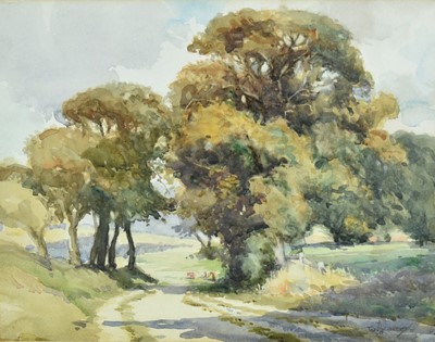 Lot 1044 - William Hyams (1878-1951) watercolour - A Summer Landscape, signed, 27cm x 34cm, together with another probably by the same hand, Cattle beneath a tree, 26cm x 37.5cm, in glazed gilt frames (2)