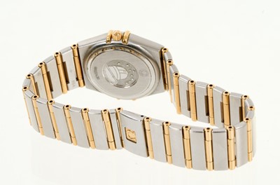 Lot 717 - Ladies Omega Constellation gold and stainless steel wristwatch, the mother of pearl dial with diamond dot hour markers