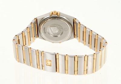 Lot 717 - Ladies Omega Constellation gold and stainless steel wristwatch, the mother of pearl dial with diamond dot hour markers