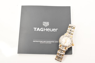 Lot 719 - Ladies Tag Heuer Professional bi-metal wristwatch on integral bracelet