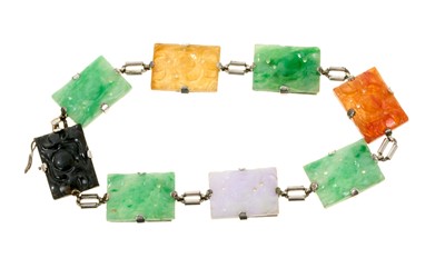 Lot 561 - Chinese jade and hardstone bracelet with carved and pierced panels in 9ct white gold setting, 18.5cm.