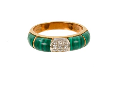 Lot 575 - 1970s diamond and malachite dress ring with pavé set single cut diamonds flanked by malachite panels, in 18ct gold setting, London 1975, ring size M.