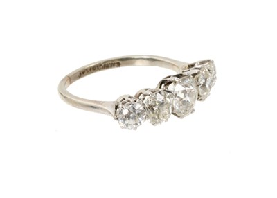 Lot 564 - Antique diamond five stone ring with five graduated old cut diamonds estimated to weigh approximately 2cts in total, in platinum claw setting on 18ct gold shank, ring size M.