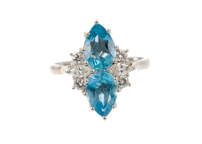 Lot 569 - Aquamarine and diamond cocktail ring with two pear-cut aquamarines flanked by marquise cut and brilliant cut diamonds to the shoulders, in claw setting on 18ct white gold shank, London 1976, ring s...