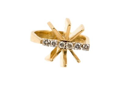 Lot 570 - 1970s diamond and 18ct gold ring, the star shape stylised design with a line of six brilliant cut diamonds, sponsor's mark WM(D), London 1973, ring size K.