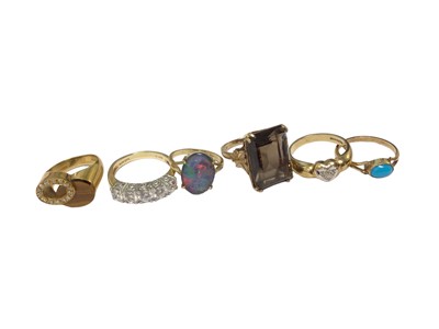 Lot 15 - 1970s 18ct gold diamond and tiger's eye ring, 14ct gold synthetic five stone ring, 10ct gold opal doublet ring and three other 9ct gold gem set rings (6)