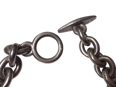 Lot 89 - Georg Jensen Danish silver bracelet with large heavy silver chain links and toggle clasp, numbered 140B